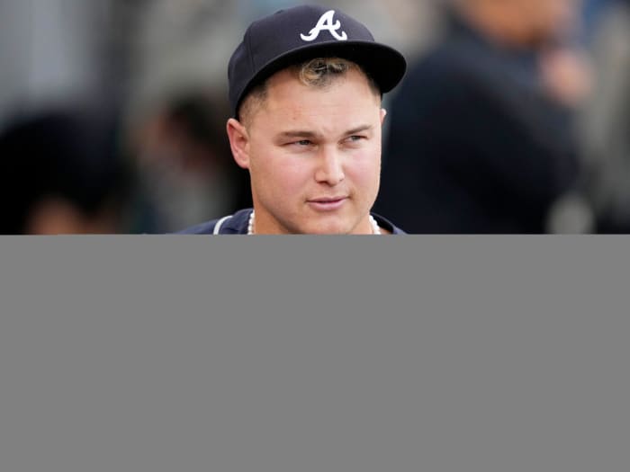 Oct 21, 2021; Los Angeles, California, USA; Atlanta Braves right fielder Joc Pederson (22) wears pearls in the dugout before game five of the 2021 NLCS against the Los Angeles Dodgers at Dodger Stadium.